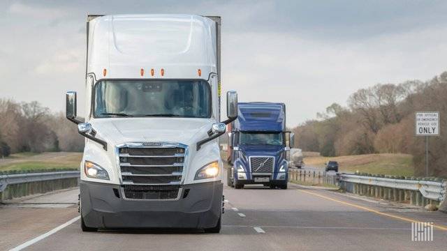 White truck on the road 1200x675